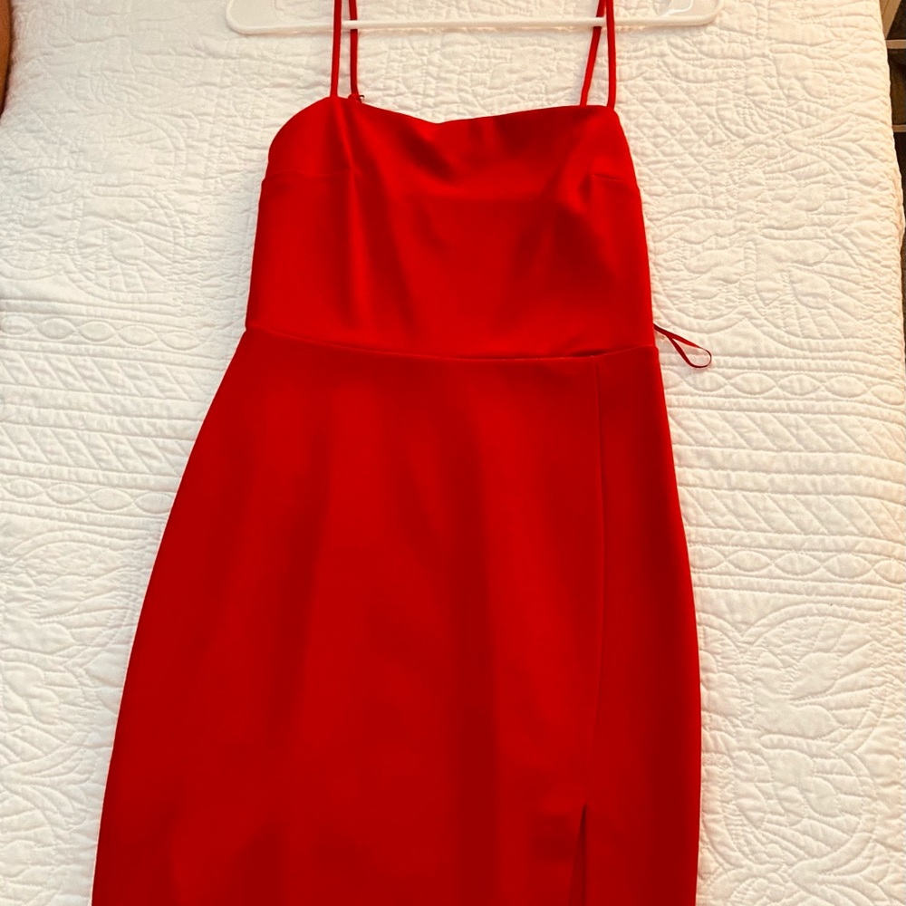 New with tags red Express dress with small slit